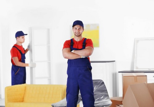 Professional local removals in Shepherdsbush with moving van and packed boxes