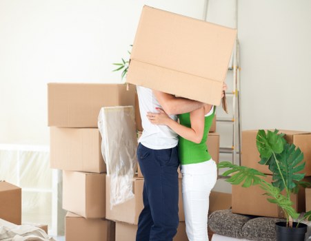 Customer using a trolley to move a boxed item safely