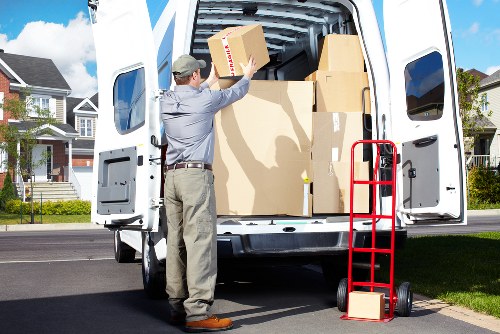 Packed moving boxes ready for removals in Shepherdsbush